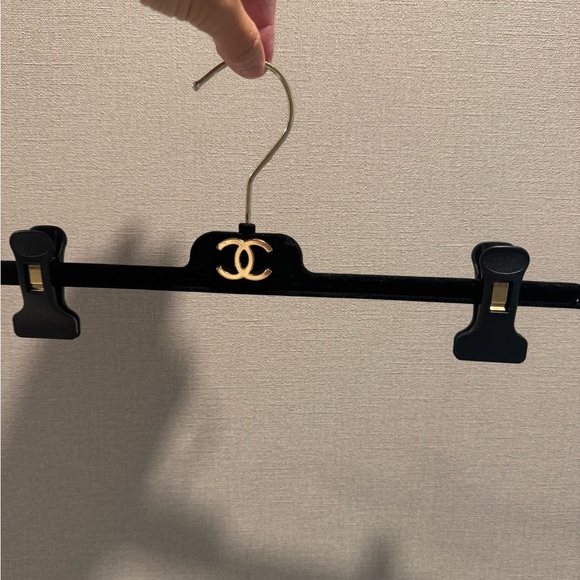 CHANEL Black and Gold Closet Hanger